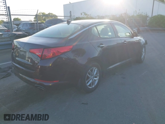 2013 Kia Optima LX with VIN 5XXGM4A71DG124725, listed as a IAAI auction lot 42041768 with 184,181 mi miles and . Bid and sale history available at carsss.com. Image 4.