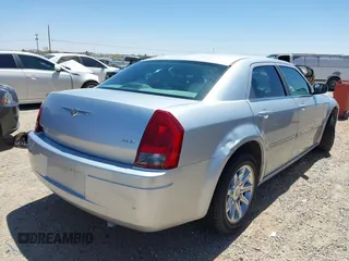 2007 Chrysler 300 with VIN 2C3KA43RX7H664582, listed as a IAAI auction lot 42106297 with 141,866 mi miles and . Bid and sale history available at DreamBid. Image 4.