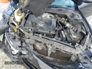 2002 Nissan Altima SE z VIN 1N4BL11D52C257427, wystawiony jako Copart lot #56577585 z przebiegiem 364 788 mil mil oraz Szkoda całkowita • Salvage title. Historia ofert i sprzedaży dostępna na DreamBid. Obrazek 11.