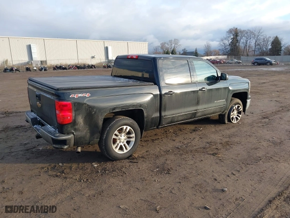 2015 Chevrolet Silverado 1500 LT with VIN 3GCUKREC6FG234389, listed as a IAAI auction lot 41008340 with 120,718 mi miles. Bid and sale history available at carsss.com. Image 4.