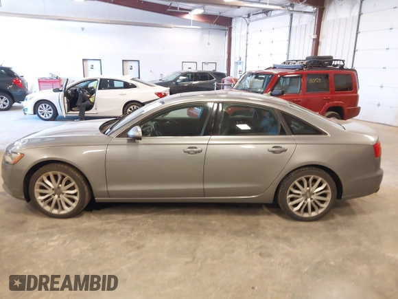 2014 Audi A6 Premium Plus with VIN WAUGFAFCXEN085327, listed as a IAAI auction lot 42094205 with 97,389 mi miles and . Bid and sale history available at DreamBid. Image 14.