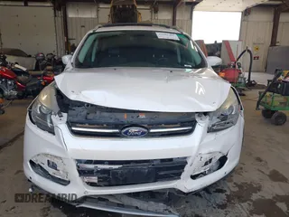 2013 Ford Escape Titanium with VIN 1FMCU9J96DUC60268, listed as a IAAI auction lot 42095407 with 105,307 mi miles and . Bid and sale history available at DreamBid. Image 12.