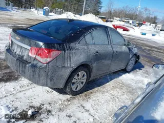 2015 Chevrolet Cruze LS with VIN 1G1PA5SG8F7191999, listed as a IAAI auction lot 41555183 with 103,567 mi miles. Bid and sale history available at carsss.com. Image 4.