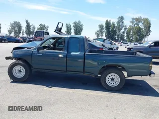 1995 Toyota Tacoma with VIN 4TAUN53B5SZ082797, listed as a IAAI auction lot 42660124 with 181,066 mi miles and . Bid and sale history available at DreamBid. Image 14.