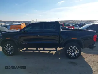 2024 GMC Canyon 4WD AT4 with VIN 1GTP6DEK9R1118926, listed as a IAAI auction lot 40998280 with 10,958 mi miles. Bid and sale history available at carsss.com. Image 14.