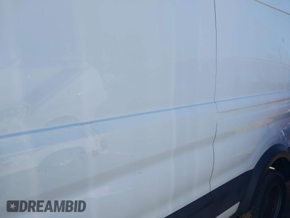 2019 Ford Transit Cargo with VIN 1FTBF4XG4KKB77790, listed as a IAAI auction lot 41711746 with 198,739 mi miles. Bid and sale history available at carsss.com. Image 6.