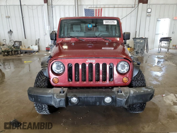 2008 Jeep Wrangler Unlimited Sahara z VIN 1J4GA59198L570409, wystawiony jako Copart lot #58853295 z przebiegiem 84 502 mil mil oraz Nie do naprawy • Non repairable. Historia ofert i sprzedaży dostępna na DreamBid. Obrazek 5.