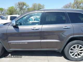 2014 Jeep Grand Cherokee Limited z VIN 1C4RJFBT0EC241030, wystawiony jako IAAI lot #41851316 z przebiegiem 104 344 mil mil oraz . Historia ofert i sprzedaży dostępna na DreamBid. Obrazek 15.