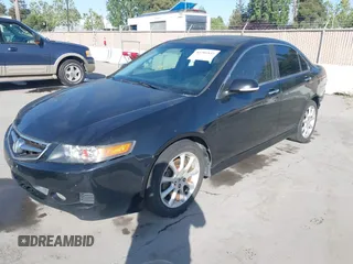 2006 Acura TSX Navi with VIN JH4CL969X6C014461, listed as a IAAI auction lot 42206844 with 119,201 mi miles and . Bid and sale history available at carsss.com. Image 2.