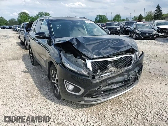 2018 Kia Sorento EX z VIN 5XYPH4A53JG359248, wystawiony jako Copart lot #56368755 z przebiegiem 49 702 mil mil oraz Szkoda całkowita • Salvage title. Historia ofert i sprzedaży dostępna na DreamBid. Obrazek 14.