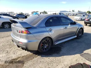 2015 Mitsubishi Lancer Evolution Final Edition z VIN JA32W7FV5FU028542, wystawiony jako Copart lot #67491522 z przebiegiem 83 173 mil mil oraz . Historia ofert i sprzedaży dostępna na DreamBid. Obrazek 3.