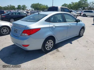 2014 Hyundai Accent GLS with VIN KMHCT4AE2EU608104, listed as a IAAI auction lot 41943590 with 125,808 mi miles. Bid and sale history available at carsss.com. Image 4.
