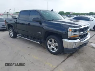 2018 Chevrolet Silverado 1500 LT with VIN 3GCPCREC5JG557884, listed as a IAAI auction lot 41889798 with 112,668 mi miles and . Bid and sale history available at DreamBid. Image 1.