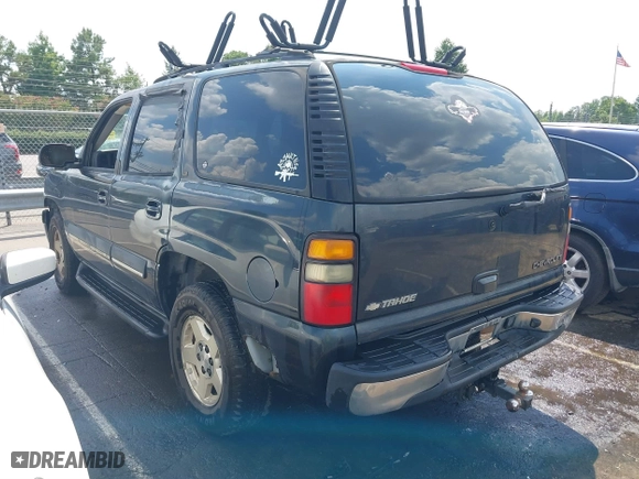 2004 Chevrolet Tahoe LT with VIN 1GNEC13Z04J134981, listed as a IAAI auction lot 39886652 with 244,056 mi miles. Bid and sale history available at carsss.com. Image 3.