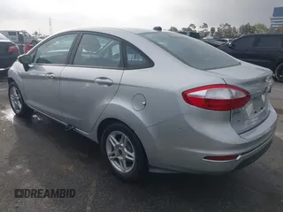 2017 Ford Fiesta SE with VIN 3FADP4BJXHM116900, listed as a IAAI auction lot 41815656 with 74,662 mi miles and . Bid and sale history available at DreamBid. Image 3.