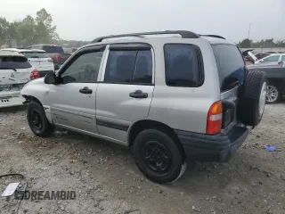 2002 Chevrolet Tracker z VIN 2CNBE13C926934704, wystawiony jako Copart lot #70717194 z przebiegiem 189 076 mil mil oraz Szkody całkowita. Historia ofert i sprzedaży dostępna na DreamBid. Obrazek 2.