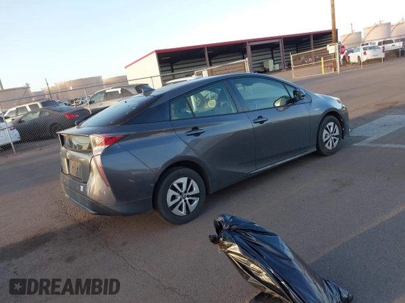 2018 Toyota Prius Two with VIN JTDKBRFU6J3582025, listed as a IAAI auction lot 41681244 with 77,504 mi miles and . Bid and sale history available at carsss.com. Image 4.