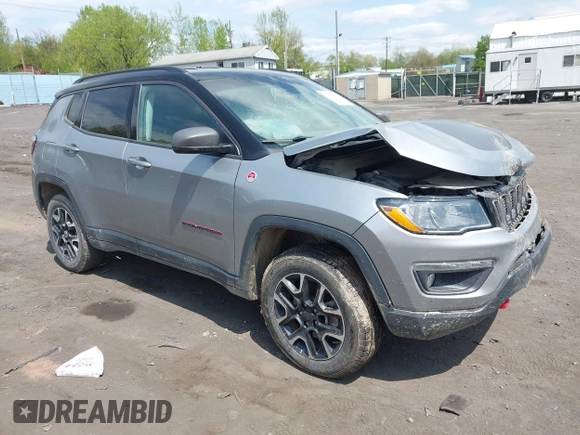 2020 Jeep Compass Trailhawk with VIN 3C4NJDDB4LT171685, listed as a IAAI auction lot 42168366 with 76,390 mi miles and . Bid and sale history available at DreamBid. Image 1.