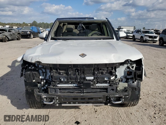 2023 Rivian R1S Adventure with VIN 7PDSGBBA3PN017791, listed as a Copart auction lot 82397374 with 20,733 mi miles and Salvage Title. Bid and sale history available at carsss.com. Image 5.
