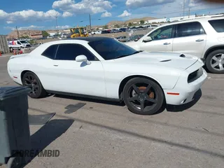 2015 Dodge Challenger SXT Plus with VIN 2C3CDZBG3FH913585, listed as a IAAI auction lot 42609599 with 85,524 mi miles and . Bid and sale history available at DreamBid. Image 13.