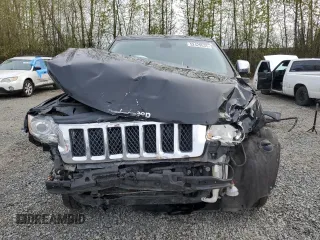 2013 Jeep Grand Cherokee Overland with VIN 1C4RJFCGXDC643802, listed as a Copart auction lot 52429535 with 122,014 mi miles and Salvage Title. Bid and sale history available at carsss.com. Image 5.