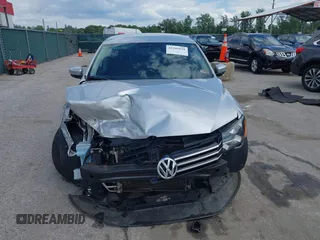 2013 Volkswagen Passat SE z VIN 1VWBP7A38DC123553, wystawiony jako IAAI lot #42341621 z przebiegiem 178 504 mil mil oraz . Historia ofert i sprzedaży dostępna na DreamBid. Obrazek 13.