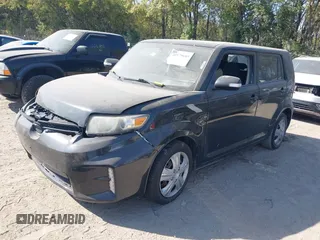 2014 Scion xB z VIN JTLZE4FE5EJ059750, wystawiony jako IAAI lot #40579685 z przebiegiem 106 302 mil mil oraz . Historia ofert i sprzedaży dostępna na DreamBid. Obrazek 2.