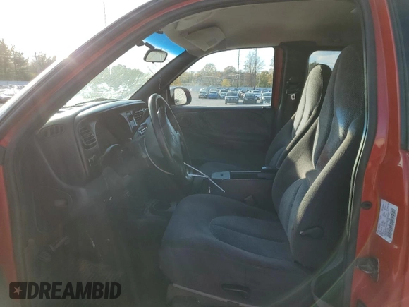 1997 Dodge Dakota z VIN 1B7GG23X0VS187346, wystawiony jako Copart lot #79128194 z przebiegiem 116 778 mil mil oraz Szkoda całkowita • Salvage title. Historia ofert i sprzedaży dostępna na DreamBid. Obrazek 7.