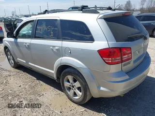 2009 Dodge Journey SXT with VIN 3D4GG57V19T138643, listed as a IAAI auction lot 41901454 with 150,576 mi miles. Bid and sale history available at carsss.com. Image 3.