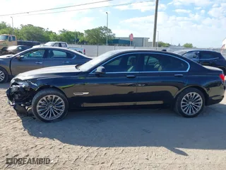 2012 BMW 7 Series 740i with VIN WBAKA4C51CC613636, listed as a IAAI auction lot 41908801 with 127,725 mi miles. Bid and sale history available at carsss.com. Image 15.