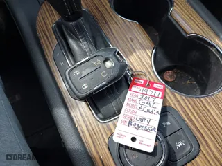 2017 GMC Acadia Denali with VIN 1GKKNXLS3HZ136182, listed as a IAAI auction lot 41934256 with 165,207 mi miles. Bid and sale history available at carsss.com. Image 11.
