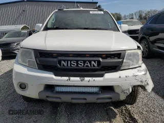 2015 Nissan Frontier Pro-4X with VIN 1N6AD0EV5FN700571, listed as a Copart auction lot 50974615 with 138,930 mi miles and Salvage title. Bid and sale history available at DreamBid. Image 5.