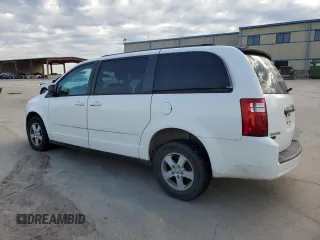 2010 Dodge Grand Caravan SE with VIN 2D4RN4DE9AR237795, listed as a Copart auction lot 55561025 with 212,109 mi miles and Clean Title. Bid and sale history available at DreamBid. Image 2.