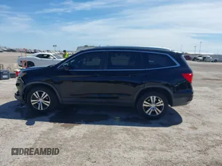 2016 Honda Pilot EX-L with VIN 5FNYF6H58GB018830, listed as a IAAI auction lot 41814636 with 147,242 mi miles. Bid and sale history available at carsss.com. Image 14.