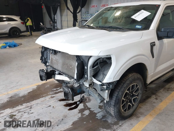 2023 Ford F-150 XL with VIN 1FTEW1EPXPKF97673, listed as a IAAI auction lot 41349562 with 35,687 mi miles. Bid and sale history available at carsss.com. Image 6.