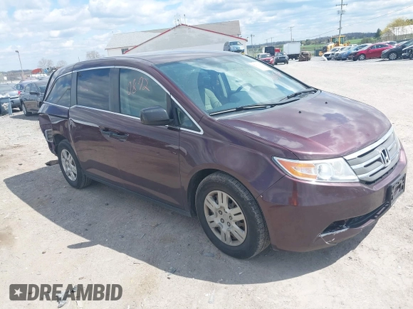 2013 Honda Odyssey LX with VIN 5FNRL5H28DB058401, listed as a IAAI auction lot 42050892 with 221,016 mi miles and . Bid and sale history available at carsss.com. Image 1.