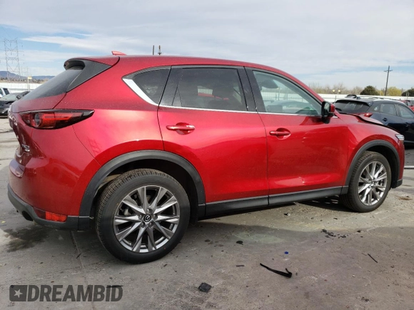 2021 Mazda CX-5 Grand Touring Reserve with VIN JM3KFBAY4M0358478, listed as a Copart auction lot 50839815 with 84,932 mi miles and Salvage Title. Bid and sale history available at DreamBid. Image 3.