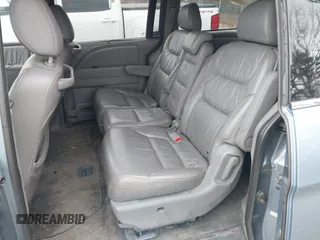 2008 Honda Odyssey EX-L with VIN 5FNRL38678B092343, listed as a IAAI auction lot 40974522 with 209,280 mi miles and . Bid and sale history available at DreamBid. Image 8.