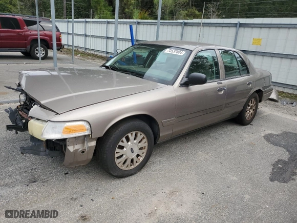 2005 Ford Crown Victoria LX with VIN 2FAFP74W95X126417, listed as a Copart auction lot 73537004 with 246,163 mi miles and Salvage Title. Bid and sale history available at carsss.com. Image 1.