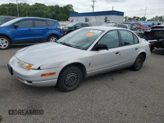 2000 Saturn SL with VIN 1G8ZG5284YZ152285, listed as a Copart auction lot 59344165 with Not provided miles and Salvage title. Bid and sale history available at DreamBid. Image 1.
