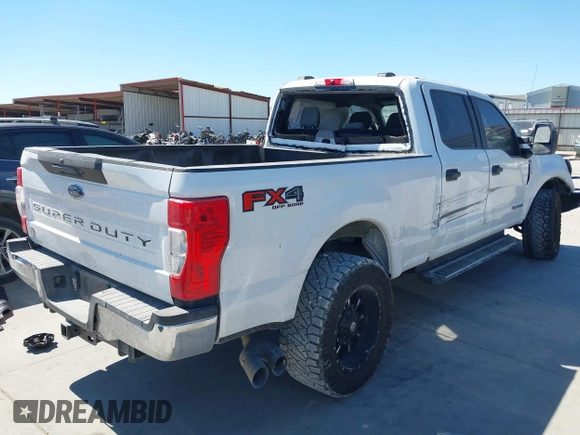 2021 Ford Super Duty F-250 SRW XL with VIN 1FT7W2BT3MEC30933, listed as a IAAI auction lot 41836915 with 100,089 mi miles. Bid and sale history available at carsss.com. Image 4.