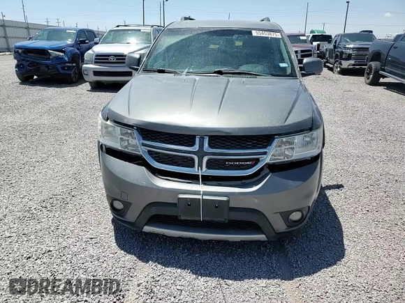 2012 Dodge Journey SXT z VIN 3C4PDDBG0CT345864, wystawiony jako Copart lot #55453875 z przebiegiem 142 444 mil mil oraz Szkoda całkowita • Salvage title. Historia ofert i sprzedaży dostępna na DreamBid. Obrazek 14.