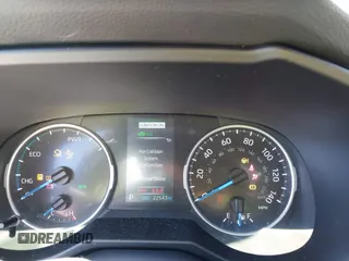 2022 Toyota RAV4 Hybrid SE with VIN 4T3T6RFV7NU100943, listed as a IAAI auction lot 42621376 with 22,543 mi miles and . Bid and sale history available at DreamBid. Image 7.