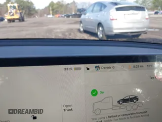 2023 Tesla Model 3 with VIN 5YJ3E1EAXPF666252, listed as a IAAI auction lot 42009929 with 27,328 mi miles and . Bid and sale history available at DreamBid. Image 18.