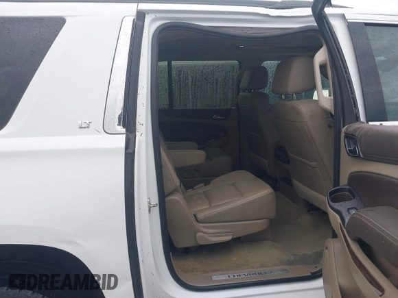 2018 Chevrolet Suburban LT with VIN 1GNSCHKC2JR376239, listed as a IAAI auction lot 42110551 with 123,694 mi miles and . Bid and sale history available at DreamBid. Image 8.