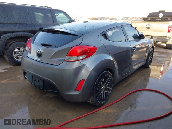 2013 Hyundai Veloster w/Black Int with VIN KMHTC6AD2DU158889, listed as a IAAI auction lot 41878065 with 157,450 mi miles and . Bid and sale history available at DreamBid. Image 4.