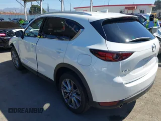 2020 Mazda CX-5 Grand Touring with VIN JM3KFADM0L1838495, listed as a IAAI auction lot 41991566 with 32,021 mi miles. Bid and sale history available at carsss.com. Image 3.