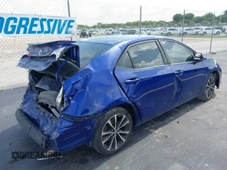 2017 Toyota Corolla L with VIN 5YFBURHE3HP632686, listed as a IAAI auction lot 42355095 with 122,139 mi miles and . Bid and sale history available at DreamBid. Image 4.