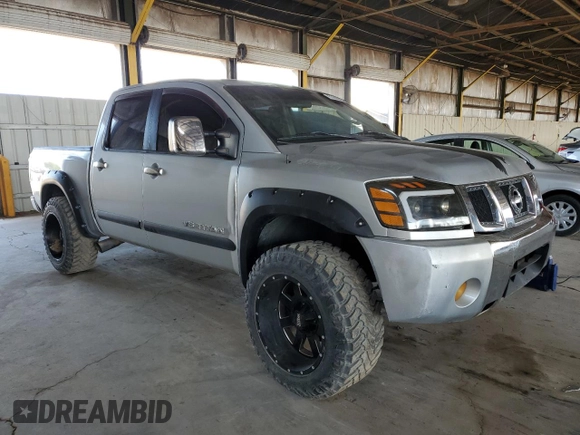 2006 Nissan Titan LE with VIN 1N6BA07A16N573521, listed as a Copart auction lot 51449665 with 158,613 mi miles and Clean Title. Bid and sale history available at DreamBid. Image 4.