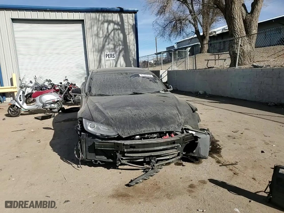 2015 Tesla Model S 85D with VIN 5YJSA1H40FF097620, listed as a Copart auction lot 87309094 with 0 miles and Salvage Title. Bid and sale history available at carsss.com. Image 12.